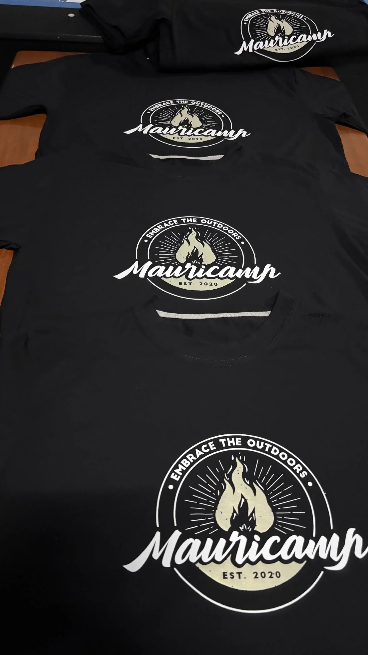 Black Mauricamp T-shirts with white camping logo prints